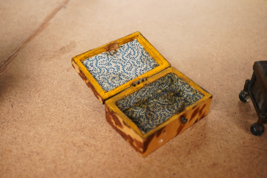 A 19th century miniature brass and agate trinket box and two early 19th century tortoiseshell needle boxes, largest 5.5cm wide x 2.5cm high